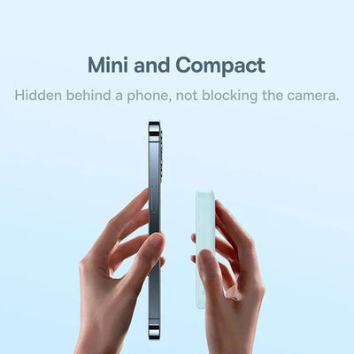 Mini and compact wireless portable charger Apple 14 held next to a phone without blocking the camera